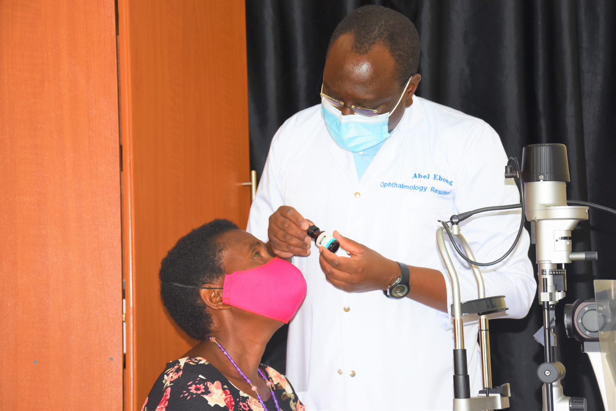 Dr Abel Ebong, one of the registrars at Mbarara University tertiary eye hospital in Uganda administers Chlorhexidine eye drops to a patient with Fungal Keratitis. Image: Simon Arunga