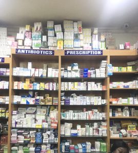 Several shelves in a pharmacy in Nigeria
